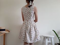 "Cream Floral Print Dress - Canvas fabric - Invisible nylon zipper on the back - Fixed waist - Fully lined - Pleated skirt - Ready to ship in 1-3 business days Measurements : Bust : 34\" Waist : 26\" Hips : free Total length : 35.5\" Shoulder to waist : 14.5\" Model height : 5'6\" bust : 33\" waist : 25\" hips : 35\" Please read the policies tab before purchase. I can't have a model for clothes of all sizes, but I have already clearly written a model size. If you have questions about the size, p Cotton Sundress With Daisy Print, Fitted V-neck Dress With Daisy Print, Summer Daisy Print Knee-length Dress, Casual Sleeveless Daisy Print Dress, Womens Summer Dress, Canvas Dress, Cream Floral Dress, Daisy Print Dress, Sleeveless Daisy Print Mini Dress