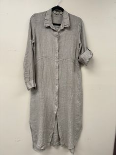 An effortless addition to elevate your summer wardrobe, our Italian linen long button-down shirt dress is crafted of light yet durable linen. The relaxed, boyfriend silhouette and rolled-up long sleeves make it perfect for those in-between days, while two pockets add a practical yet stylish touch. Wear it open or buttoned for a sophisticated, artfully-crafted look. 2454 Slip Dress Linen Shirt, Collared Beige Linen Shirt Dress, Beige Collared Linen Shirt Dress, Casual Long Sleeve Linen Dress With Button Closure, Oversized Linen Dress For Work, Linen Shirt Dress With Button Closure For Daywear, Spring Long Sleeve Neutral Linen Dress, Neutral Long Sleeve Linen Dress For Spring, Spring Neutral Long Sleeve Linen Dress