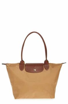 Longchamp Medium Le Pliage Nylon Shoulder Tote | Nordstrom Brown Nylon Bag With Leather Trim, Classic Everyday Waterproof Bags, Classic Waterproof Everyday Bags, Classic Brown Nylon Bag, Waterproof Leather Bags, Classic Nylon Bag With Leather Trim, Classic Nylon Bags With Leather Trim, Classic Nylon Shoulder Bag For Shopping, Packable Leather Bag