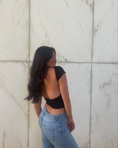 marble wall background 
summer 
black shirt and jeans 
natural makeup Low Back Shirt Outfit, Back Less Top Outfit, Open Back Outfit Casual, Black Open Back Top, Backless Top Picture Ideas, Open Back Top Outfit Classy, Poses For Backless Top, Low Back Top Outfit, Black Backless Top Outfit