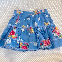 Never Worn Perfect Condition, Size Petite But Fits Small Easily Blue Ruffled Mini Skirt For Beach, Vacation Blue Skirt With Ruffles, Blue Ruffled Skirt For Vacation, Blue Ruffled Skirt For Summer, Blue Ruffled Summer Skirt, Light Blue Summer Skirt For Spring, Light Blue Skirt For Spring And Summer, Blue Cotton Vacation Skirt, Blue Floral Print Mini Skirt For Summer