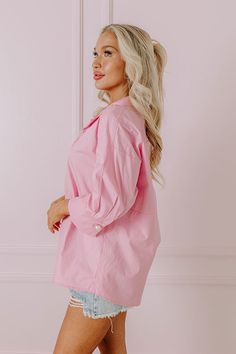 - From office hours to after hours, this chic top will keep you looking stylish! - Unlined material - A collared v-cut neckline featuring a faux pearl button for additional coverage and a pleated detail - ¾ length sleeves with button closure cuffs - A relaxed silhouette that ends in a subtly rounded hemline Feminine Pink Collared Top, Pink V-neck Blouse For Work, Pink Collared Top With Button Closure, Elegant Pink Tops With Collared Neckline, Pink 3/4 Sleeve Top For Work, Pink V-neck Top For Office, Pink V-neck Office Top, Elegant Pink Blouse With 3/4 Sleeves, Pink Collared Top For Office