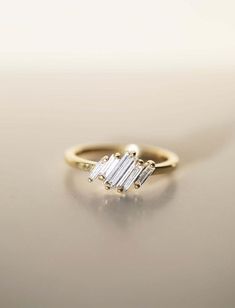 Baguette Diamond Engagement Ring - Elegant Art Deco Five Stone Ring in 14K/18K Gold - Perfect Bridal Gift for Women ✦ Handmade Item Shop ✦ Diamond: Moissanite / Lab Grown ✦ Material: 14K Solid Gold / 10K Solid Gold / 925 Sterling Silver ✦ Can Be Personalized Item ✦ If you have any questions, share with me anytime. ✦ We gladly accept custom orders too. ✦ If you cannot find the piece your heart truly desires in my shop, I promise and guarantee that I can make it for you. Just send me a picture or an illustration, and I can start a conversation about your dream piece. ՟՟՟՟՟՟՟՟՟՟՟՟՟՟՟՟՟՟՟՟՟՟՟՟՟՟՟՟՟՟՟՟՟՟՟՟՟՟՟՟՟ 💍 ✮R I N G ∙ I N F O R M A T I O N ✮💍 ՟՟՟՟՟՟՟՟՟՟՟՟՟՟՟՟՟՟՟՟՟՟՟՟՟՟՟՟՟՟՟՟՟՟՟՟՟՟՟՟՟ ➽ Stone Details :- ◈ Shape: Baguette Cut Diamond ◈ Weight: 0.30 Carat ( Approx. ) ◈ Diamond: Moissanite Simple Baguette Wedding Rings Engagement, Engagement Ring Elegant, Diamond Huggies, Elegant Engagement Rings, Baguette Ring, Bridal Gift, Elegant Art, Diamond Drops, Diamond Drop Earrings