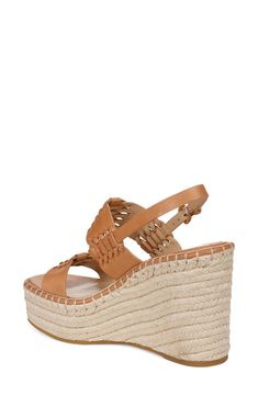 Interwoven leather straps lend visual intrigue to an espadrille-inspired slingback sandal lifted by a jute-wrapped platform and soaring wedge heel. 4 1/4" heel; 1 3/4" platform (size 8.5) Adjustable slingback strap with buckle closure Leather upper and lining/rubber sole Imported Leather Wedge Sandals With Braided Straps For Vacation, Leather Wedge Sandals With Braided Straps For Beach, Leather Wedge Sandals With Braided Straps For Summer, Natural Color Wedge Heel Sandals With Heel Strap, Leather Wedge Sandals With Braided Straps For Spring, Vacation Leather Slingback Heels, Leather Slingback Heels For Vacation, Chic Natural Leather Wedge Sandals, Beach Wedge Sandals With Heel Strap In Natural Color