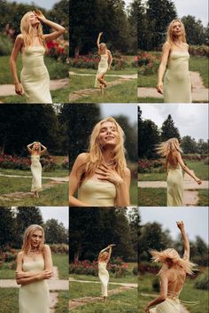 a woman in a white dress posing for pictures with her hair blowing in the wind