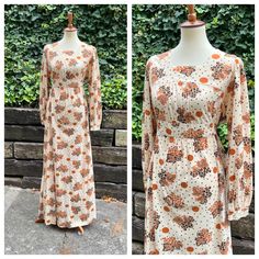 A cute and comfy 1970s maxi dress, featuring a grape print and long peasant sleeves. It pulls on over the head and has a sash at the empire waist. I've washed this dress, and it's ready to wear!  It's in excellent vintage condition. The last photo block shows a very light stain on the bust and a dot at the hem.  Measurements  Bust: 40-43 inches  Empire waist: up to 44 inches (has a sash)  Hips: up to 48 inches  Bodice length: 15 inches  Skirt length: 44 inches Modeled on a 34/26/35 mannequin.  From a smoke and pet free home. I ship Monday, Wednesday, and Friday. I do not offer returns, so please reach out with any questions or to ask for additional photos/measurements. Vintage Brown Long Sleeve Maxi Dress, Fitted Vintage Brown Maxi Dress, Fall Bohemian Maxi Dress With Square Neck, Bohemian Maxi Dress With Square Neck For Fall, Bohemian Square Neck Maxi Dress For Fall, Flowy Cream Maxi Dress For Fall, Flowy Square Neck Maxi Dress For Fall, Vintage Long Sleeve Maxi Dress With Vintage Print, Retro Long Sleeve Maxi Dress With Vintage Print