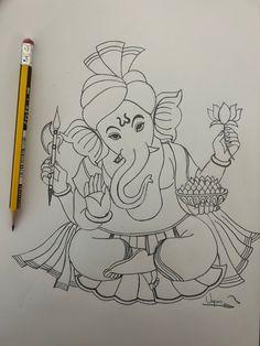 a drawing of the god ganesha on paper with pencils next to it