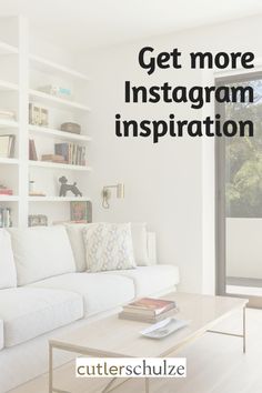 a living room filled with white furniture and lots of books on the shelves next to a window