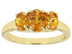 1.76ctw Oval Mandarin Garnet, 18K Yellow Gold Over Sterling Silver 3-Stone Ring. Measures Approximately 0.51"L x 0.26"W, Finished Under Gallery. Mandarin Garnet, Pyrope Garnet, Exotic Jewelry, 3 Stone Rings, Garnet Ring, Broken Chain, Garnet Rings, Garnet Gemstone, Ring Collections