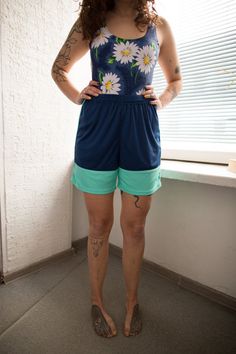 Vintage 90's y2k blue/green sporty shorts with stretchy waist line. UK size written 10, but looks flexible. Model size on the photo is 8. Measurements: length 16.5 inches, waist 28 inches (stretchy), hips 42 inches. Blue Sports Shorts For Summer, Sporty Bermuda Bottoms With Built-in Shorts, Sporty Bermuda Shorts With Built-in Shorts, Green Athletic Shorts With Built-in Liner, Green Stretch Athletic Shorts With Short Leg, Green Sports Shorts With Elastic Waistband, Green Stretch Athletic Shorts, Green Athletic Shorts With Elastic Waistband For Training, Stretch Green Athletic Shorts