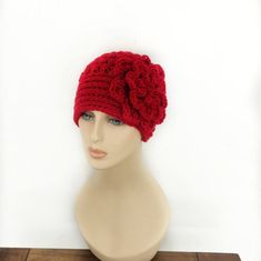 "This beautiful crochet hat with large flower on the side is my original design of 12 years and still sells the best. I hope you'll fine a color you like and get yours.  This hat best fits an average adult 22\" in circumference. We can easily customize it to fit other sizes as well! Leave a note at the check out if you need smaller or bigger size please. If you are interested in an item but would prefer a different size or color  feel free to contact us and we'll try to make it for you. The colo Red Crochet Hat, One Size Fits Most, Red Brimmed Crochet Hat Made Of Yarn, Red Crochet Beanie, One Size, Red Crochet Beanie One Size, Red Crochet Beanie, One Size Fits Most, Red Crochet Beanie From Yarn, Red Crochet Yarn Beanie, Red Crochet Beanie One Size Fits Most, Red Knitted Crochet Hat In Acrylic Yarn