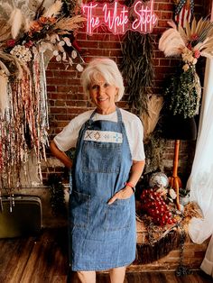 Introducing the newest addition to our cottage core collection. These adorable aprons are perfect for the homesteader, the baker or the chef in your family. This apron features a super cute embordered quilt block design (don't worry if aprons aren't your thing we also offer this on a tee shirt!) The pockets are functio The Chef, Country Western, Block Design, Quilt Block, Guinea Bissau, Dark Denim, Back Strap, Mozambique, Cottage Core