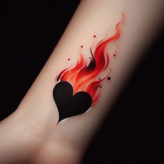 a heart tattoo on the arm with flames