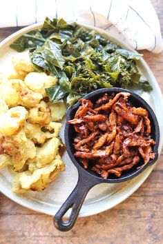 a white plate topped with different types of food