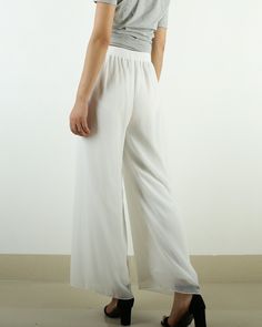 * A wide leg pants with elastic waist, made with beautiful pearl chiffon pants, very comfortable to wear, not easy to get wrinkled, very easy to take care of. * Material: outer-pearl chiffon, lining-100% polyester Custom made to fit, lead time is 6-8 days; Let us know your usual size in your country and your overall height. If you have some specific request or special characters such as broad shoulder, long arms, long waist, etc you think we need pay attention to when making, do let me know. * C Solid Color Summer Wide Leg Full Length Pants, Summer Full Length Solid Wide Leg Pants, Summer Solid Color Full Length Wide Leg Pants, Summer Solid Color Wide Leg Pants, Solid Color Summer Wide Leg Pants, Elegant Wide-leg Culottes With Elastic Waistband, Elegant Wide Leg Culottes With Elastic Waistband, Summer High-waisted Wide Leg Pants In Solid Color, Summer High-waisted Wide Leg Pants Solid Color