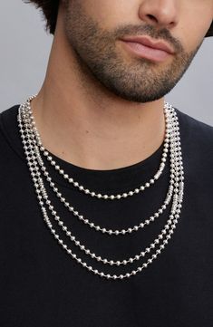 Signature Caviar beading and fluted accents lend additional intrigue to this handsome sterling silver chain necklace. Sterling silver Imported Elegant Silver Chain Necklace With Ball Chain, Elegant Silver Ball Chain Necklace, Elegant Silver Necklace With Ball Chain, Sterling Silver Necklace With Beaded Chain In White Gold, Sterling Silver White Gold Necklace With Beaded Chain, Silver Elegant Chain Necklace With Polished Beads, White Gold Sterling Silver Necklace With Beaded Chain, White Gold Sterling Silver Beaded Necklace, Silver Beaded Necklaces With Round Beads