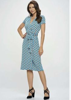 Proudly Made in USA Add a feminine touch to any wardrobe with this stunning jersey wrap dress! Featuring a wrap design and midi length, you'll be turning heads in no time. With a flattering V-neck and short sleeves, plus a tie at the waist for a perfect fit. Topped off with a unique tulip pattern, this dress will give you an air of class wherever you go! Wrap Dress Design Midi Length V-Neck Short Sleeves Tie at Waist Lightweight Jersey Material Colors: Aqua, Orange, Black & White Beautiful Uniqu Fitted Rayon Midi Dress With Short Sleeves, Knee-length Viscose Midi Dress With Tie Waist, Viscose Knee-length Midi Dress With Tie Waist, Knee-length Rayon Dress With Tie Waist, Summer Viscose Wrap Dress For Work, Fitted Viscose Wrap Dress Midi Length, Fitted Viscose Midi Wrap Dress, V-neck Rayon Midi Dress With Tie Waist, Fitted Viscose Wrap Dress With V-neck