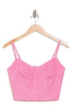 Flowery lace furthers the sweetness of this bustier-inspired crop top that's rendered in pretty pink. 15 1/2" length Exposed back-zip closure Sweetheart neck Adjustable straps 100% polyester Hand wash, line dry Imported Pink Crop Top With Built-in Bra, Pink Fitted Crop Top With Spaghetti Straps, Pink Fitted Crop Top With Built-in Bra, Sweetheart Neckline Bra-friendly Crop Top, Fitted Pink Cami Crop Top, Pink Cropped Crop Top With Built-in Bra, Fitted Bra-friendly Pink Crop Top, Pink Top With Removable Bra Pads For Spring, Pink Tops With Removable Bra Pads For Spring