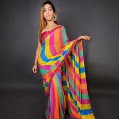 This multicolored saree is prettified with stripes printed and gota work as shown which makes it appear classy. This saree is made of georgette fabric which is accompanied with unstitched banglori silk blouse piece which you can customise as per your design/style. Women can buy this suit to wear for their festive and function. Note:- The actual product may differ slightly in color and design from the one illustrated in the images when compared with computer or mobile screen. Measurements: Saree Festive Multicolor Unstitched Pre-draped Saree, Festive Multicolor Pre-draped Saree With Unstitched Blouse, Bollywood Style Multicolor Pre-draped Saree For Navratri, Bollywood Multicolor Pre-draped Saree For Navratri, Multicolor Pre-draped Saree With Zari Work, Multicolor Pre-draped Saree With Dupatta, Multicolor Pre-draped Saree For Diwali, Multicolor Cutdana Unstitched Blouse Piece, Unstitched Multicolor Blouse Piece With Cutdana