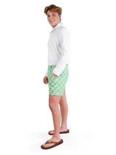 Navigate Style & Adventure with the Rhett Short Forget flimsy boardshorts and embrace versatile sophistication with the Rhett swim shorts. Designed for the man who seamlessly transitions from beachside lounging to boat deck chilling, these shorts offer superior style and functionality wherever your summer takes you. Land & Sea Ready: Quick-drying fabric: Dive into the ocean, then hit the town without a worry. The shorts dry rapidly, keeping you cool and comfortable all day long. Built-in liner: Green Athletic Shorts For Beach Season Vacation, Green Swim Trunks For Spring Poolside, Green Shorts For Warm Weather, Green Shorts For Pool Vacation, Green Pool Shorts For Vacation, Green Vacation Shorts For Pool, Summer Beach Swim Trunks With Short Inseam, Green Vacation Pool Shorts, Short Inseam Swim Trunks For Summer Beach