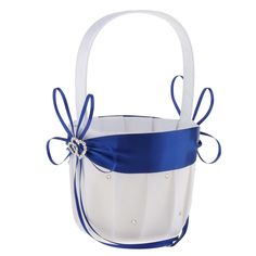 a white and blue flower girl basket with satin ribbon on the front, bowknoted at the top