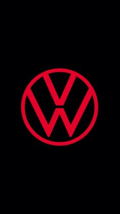 the vw logo on a black background