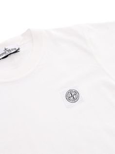 White childrens t-shirt with contrasting Stone Island logo in cotton.Composition: 100% COTTON Classic Short Sleeve T-shirt With Logo Patch, Basic White Logo T-shirt, Basic White T-shirt With Logo, White Cotton Tops With Logo Patch, Cotton Tops With Logo Emblem For Streetwear, White Short Sleeve Top With Logo Patch, Classic Cotton T-shirt With Logo Patch, Casual Cotton T-shirt With Logo Emblem, Cotton Crew Neck T-shirt With Logo Emblem