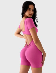 The Lizvette Romper is a stylish, functional choice for fitness lovers. Made from soft double-sided fleece, it features a U-shaped neckline and open back for elegance. The scrunch butt V-back detail enhances your curves, making it ideal for yoga, Pilates, and workouts!   Feature     U-shaped wide neckline and open back  Deep V and scrunch butt  Removable cup pads  Anti-squat, compression  Double-sided fleece fabric  4.5-inch inseam     Fabric    75% Nylon + 25% Spandex    Model Measurements    M Shorts Bodysuit, Romper For Women, Scrunch Shorts, Fitness Pilates, Sport Bra Top, Short Sleeve Romper, Sleeved Romper, V Cuts, Gym Wear