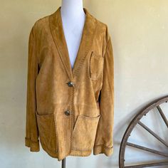 Ralph Lauren Tan Glove Soft Suede Southwestern Western Cowboy Barn Jacket With Leather Whip Stitching & Silver And Turquoise Buttons. Women's Size Medium. Rare Made In The Usa!!! Super Nice! Measurements: Approximate Shoulder To Shoulder: 18in Arm Pit To Arm Pit: 23in Sleeve Length: 26in Total Length: 27in This Gorgeous Ralph Lauren Leather Suede Western Jacket Is In Excellent Condition. No Flaws Noted. Please See Pictures & Measurements For More Details. Smoke Free Home. Feel Free To Contact Me For Any Question You Have. Ralph Lauren Casual Brown Outerwear, Casual Ralph Lauren Brown Outerwear, Casual Brown Ralph Lauren Outerwear, Chic Ralph Lauren Fall Outerwear, Ralph Lauren Blazer With Pockets For Fall, Barn Jacket, Whip Stitch, Medium Rare, Ralph Lauren Leather