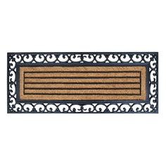 a door mat with an ornate design on the front and sides, in black and tan