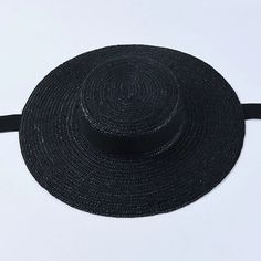 Complete your summer look with our Wide Brim Straw Boater Hat, a timeless accessory for sunny days. Crafted from straw, this boater hat features a wide brim that offers stylish sun protection. Perfect for beach outings or picnics, its classic design adds a touch of vintage charm to any outfit. Casual Straw Hat, Straw Boater Hat, Straw Boater, Black And White Ribbon, Floppy Sun Hats, Wide Brim Sun Hat, Boater Hat, Kentucky Derby Hat, Derby Hat