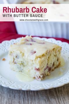 a piece of rhubarb cake with butter sauce on a white plate next to a casserole dish