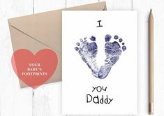 a card with a baby's foot print on it