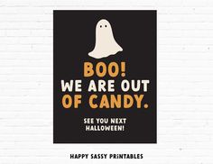 a black and white poster with the words boo we are out of candy on it