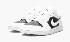 The Women’s Air Jordan 1 Low “Panda” is a timeless look for the women’s sizing of Michael Jordan’s first signature shoe arranged in a two-tone white-and-black color scheme.  Whether or not pandas were the actual inspiration for the design, the aptly named “Panda” does indeed draw from the large bear’s white-and-black coat.  Specifically, black leather graces the perforated toe and mid-panel.  The rest of the shoe, including the forefoot, eyelets, collar, heel, and Swoosh, are cast in a supple wh Womens Air Jordan 1, Womens Air Jordan, Panda Shoes, Jordan 1 Low White, Wmns Air Jordan 1, Jordan Ones, Nike Air Jordan 1 Low, All Nike Shoes, Womens Air Jordans