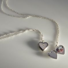 An instant heirloom, the Dollhouse Heart Locket is perfectly balanced in size and sentiment; a nostalgic classic that is just sweet enough. Made to slip on and off of our chains - we cannot guarantee that they will work with other chains. Note: we Catbirds love to mix metals!The Catbird collection is designed and manufactured in our in-house studio, with the exception of a few very special parts and elements. This locket is made just for us in a studio that's been family owned and operated since Heart Locket Necklace Silver, Catbird Jewelry, Silver Heart Locket, You Are My Moon, Dope Jewelry Accessories, Jewelry Gift Guide, Antique Jewellery Designs, Cleaning Silver Jewelry, Heart Locket Necklace