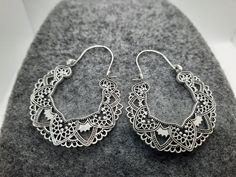 Boho hoop earrings. Handmade Silver Small Hoop Earrings, Silver Hypoallergenic Hoop Earrings For Festivals, Bohemian Silver Metal Hoop Earrings, Bohemian Silver Pierced Flower Earrings, Bohemian Silver Flower Pierced Earrings, Silver Small Hoop Earrings For Festival, Silver Hoop Earrings For Festival, Silver Hoop Jewelry For Festival, Bohemian Small Hoop Silver Earrings