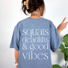 This Squats Deadlifts And Good Vibes Gym Shirt is the perfect pump cover for all gym rats and gym girls. It can be giftet as gym gift for your girlfriend. ♥PRODUCTION TIME: 1-5 days (Usually 2-3 days)   ♥SHIPPING TIME: 2-5 days (Usually 3 days)   ♥PRODUCT DESCRIPTION: The Comfort Colors 1717 tee is made with medium fabric (6.1 oz/yd² (206.8 g/m consisting of high quality, 100% ring-spun US cotton for long-lasting comfort.   Our Relaxed Fit Tee  is a unisex style that runs a touch small for men, Gym Rats, Gym Shirt, Gifts For Your Girlfriend, Gym Rat, Unisex Style, Weight Lifting