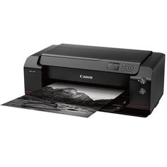 a canon printer is shown with the ink on it