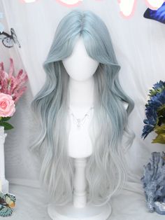 Transform your look with this stunning Blue and Grey Ombre Long Wavy Synthetic Wig featuring elegant curtain bangs. The seamless blend of blue and grey shades creates a mesmerizing ombre effect. The long, wavy design provides volume and movement, while the curtain bangs frame your face beautifully.  Garment Size   	 		 			Size 			Free Size 		 		 			Hair Length 			65-70 Blue Hair Curtain Bangs, Wig With Curtain Bangs, Pretty Hair Cuts, Cool Hair Designs, Blue Ombre Hair, Light Blue Hair, Grey Shades, Kpop Hair, Wavy Design