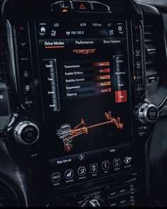 the interior of a vehicle with dashboard controls