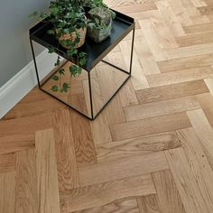 a small table with some plants on it