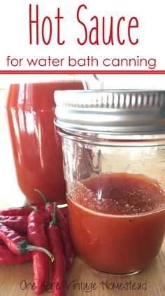 hot sauce for water bath canning in a mason jar with red peppers on the side