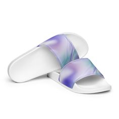 Keep up with the latest trends with these chic BeSculpt Slides! Crafted from quality materials, these slides feature vibrant, abstract art to add color and style to any look. Step out in confidence with these fashionable slides! This pair of Blue Haze BeSculpt Abstract Art Women's Slides gives you comfort and style while walking anywhere, whether it's at the airport, around the block, to the beach, or to the pool. A pair of these will keep you comfy throughout your day thanks to the cushioned up Multicolor Slip-on Slides For Summer, Blue Slide Slippers For Spring, Trendy Blue Slides For Summer, Trendy Blue Slides For Spring, Trendy Blue Slide Sandals, Blue Trendy Summer Slippers, Trendy Blue Summer Slippers, Purple Synthetic Slides For Spring, Casual Multicolor Slide Flip Flops