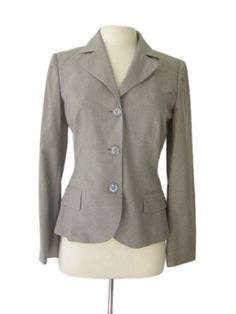 Here is a wonderful women's jacket/blazer from Kiton. As is their sartorial tradition, each Kiton garment is handmade in their factory in Naples, Italy and features the finest hand stitching throughout, and of course their exclusive fabrics are among the most luxurious in the world! PLEASE NOTE THE KITON LABEL IS MISSING DETAILS: Color: Light grey hairline striped Size Tagged: IT 42 Fabric: 100% Wool 150's Weight: Spring/Summer Model: 3-Button Lining: Partial Vents: None Sleeve buttons: Non-Functional Made in: Italy MEASUREMENTS: Bust: 37" Shoulders: 16" Sleeve length: 25" Length from bottom of collar: 24" Bespoke Blazer For Fall Workwear, Semi-formal Blazer With Covered Buttons And Lapel Collar, Semi-formal Blazer With Covered Buttons And Suit Collar, Fitted Blazer With Button Closure For Tailoring, Semi-formal Blazer With Covered Buttons, Bespoke Fitted Wool Blazer, Formal Blazer With Notch Lapel And Covered Buttons, Bespoke Tailored Fall Blazer, Bespoke Fitted Winter Blazer