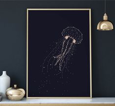 a black and white poster with a jellyfish in it's head on a shelf