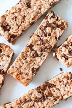 granola bars are arranged on a white surface