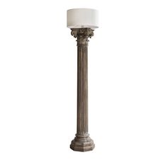 a tall lamp with a white shade on it's top and bottom part in the middle