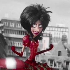 the animated character is dressed in red and black, while she stands on top of a building