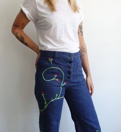 "WAS $132 now $95 Amazing 70s button fly sailor bells with embroidered vines and flowers through out. High rise, button fly, patch pockets, and belt loops. Measurements: fits like a medium Model wears a modern size 28 for reference waist:31\" hips:37\" rise:11.5\" inseam:27\" No label Great vintage condition" Big Sleeves Dress, Embroidered Vines, Military Suit, Big Sleeves, Sailor Pants, Suspender Pants, Chiffon Wrap, American Denim, 1980s Dresses